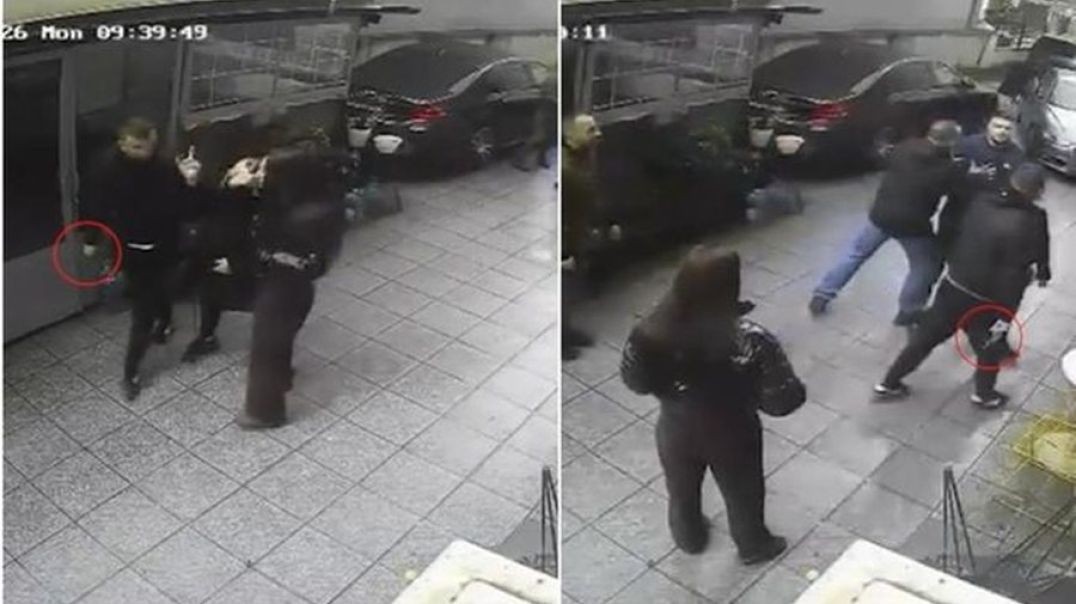 Polici i nxjerr armën e shërbimit punonjësit të biznesit gjatë një sherri